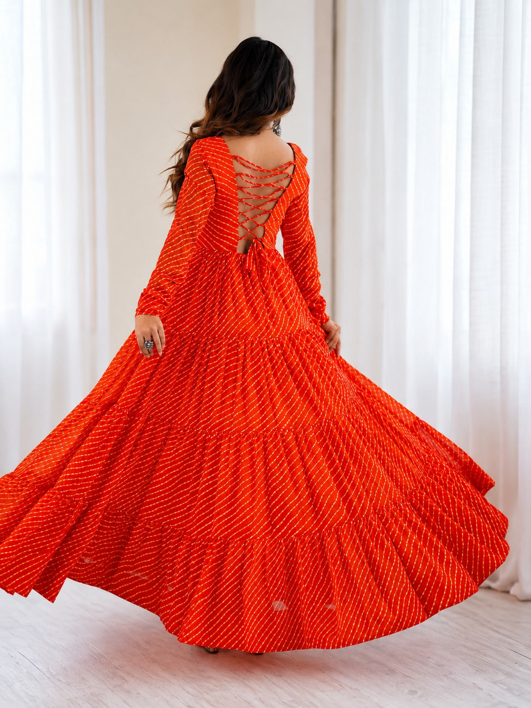 Aaradhya Orange Laheriya Printed Gamthi Work 4-Layer Flared Anarkali Gown