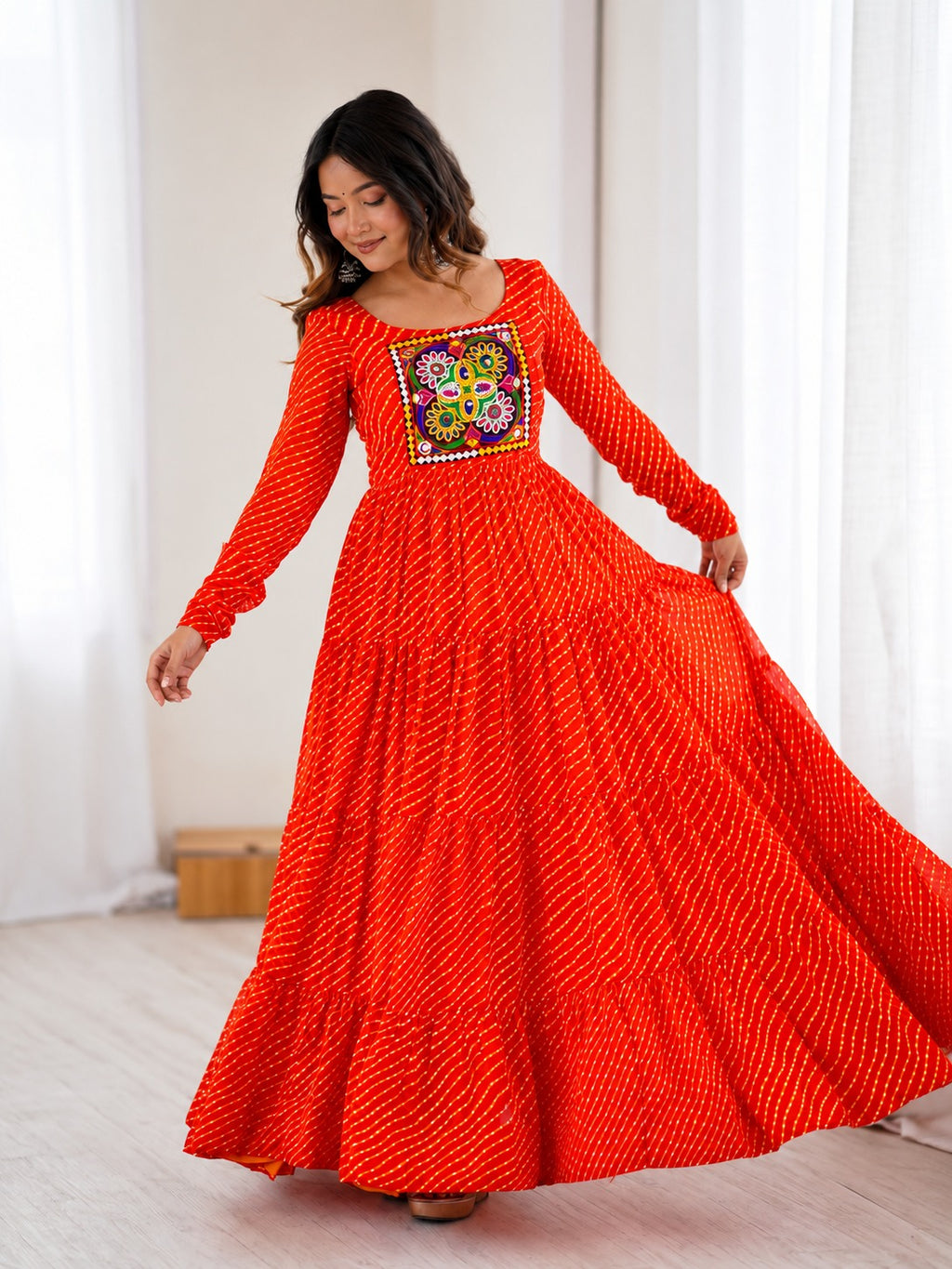 Aaradhya Orange Laheriya Printed Gamthi Work 4-Layer Flared Anarkali Gown