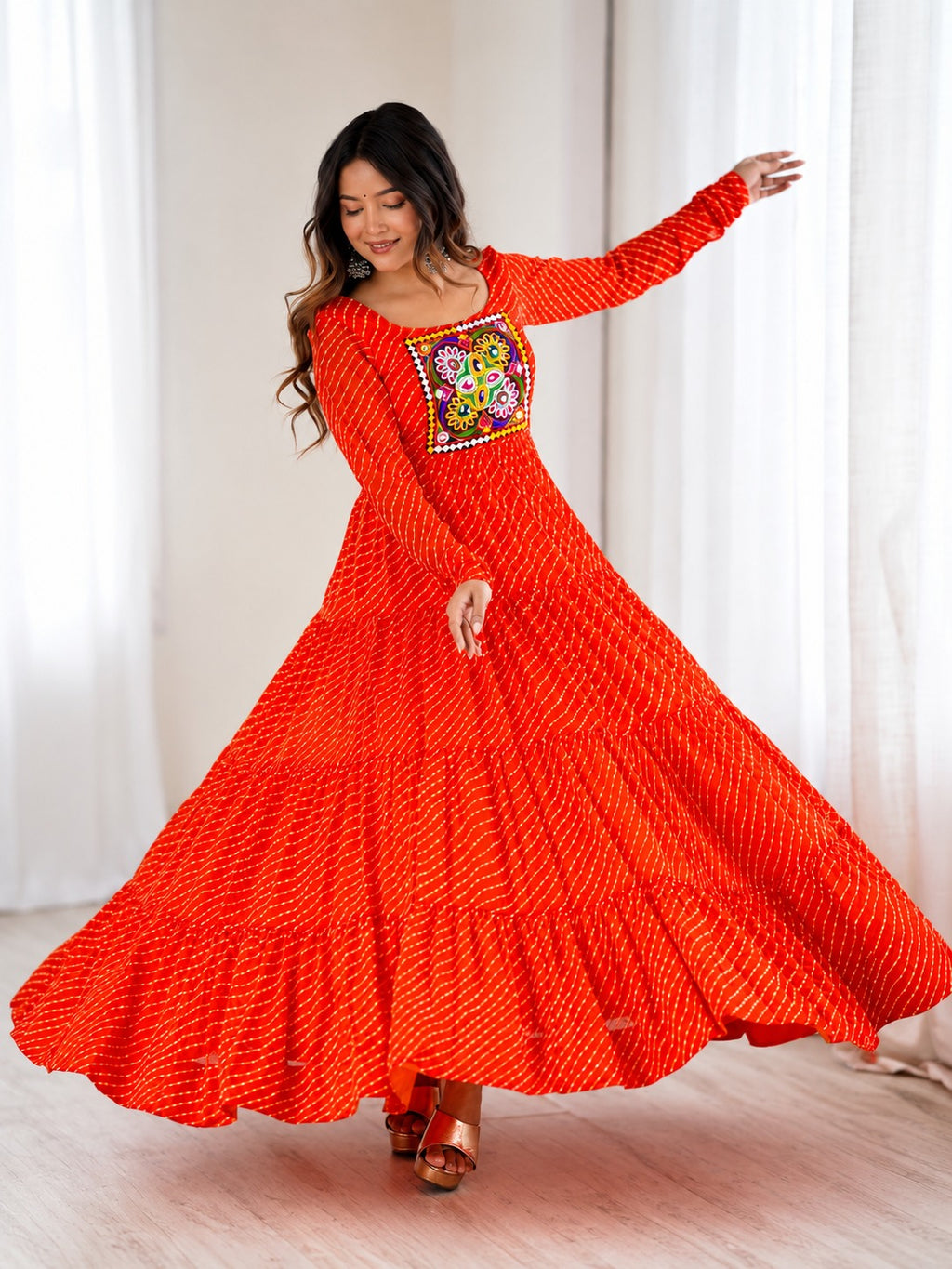 Aaradhya Orange Laheriya Printed Gamthi Work 4-Layer Flared Anarkali Gown