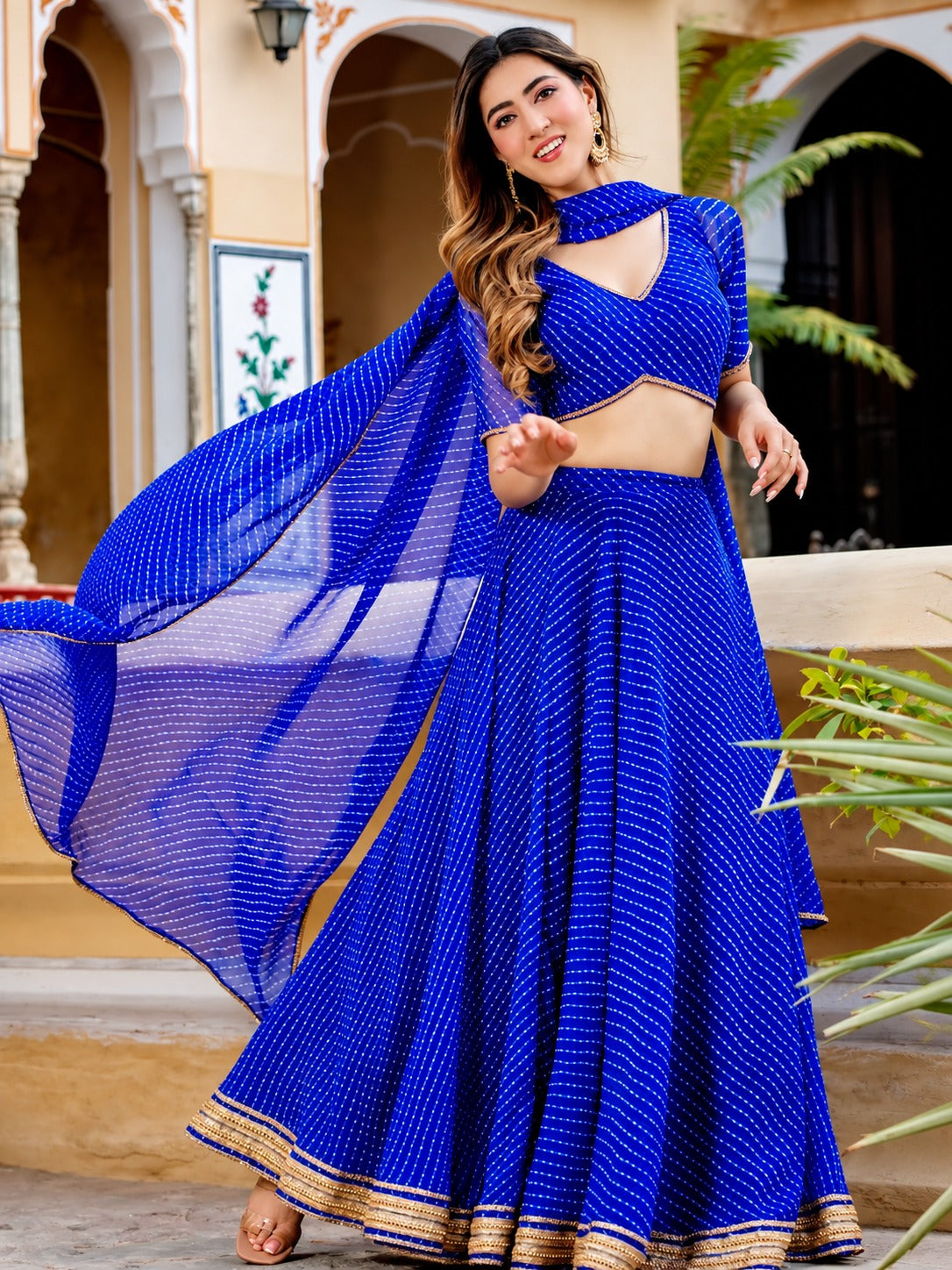 Aaru Royal Blue Striped Georgette Lehenga Choli Set with Golden Lace Border