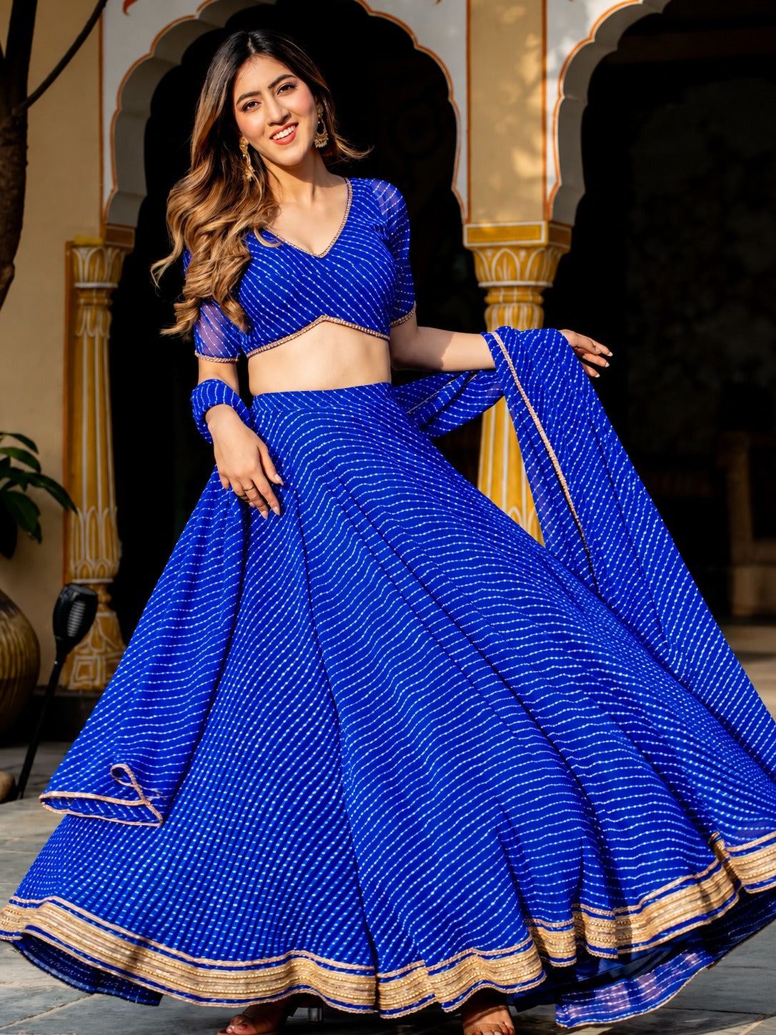 Aaru Royal Blue Striped Georgette Lehenga Choli Set with Golden Lace Border